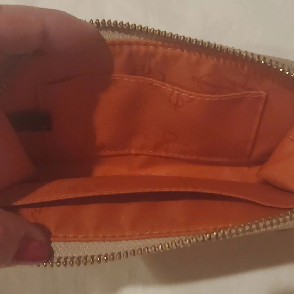 Cole Haan zip around wallet. Snake